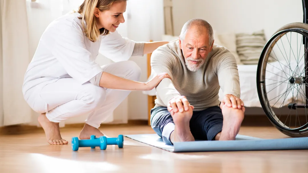 Man doing physical therapy at home