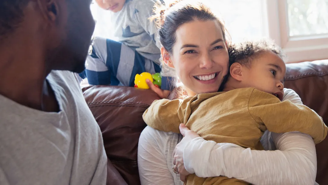 Mom hugging child