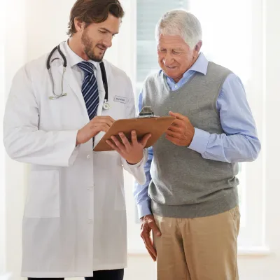 Older man visits the doctor for tests