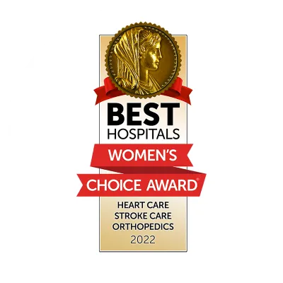 A gold ribbon listing what AdventHealth is recognized for in 2022