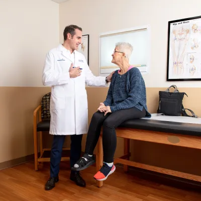 Doctor speaking with patient
