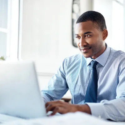 Young professional man working on a laptop