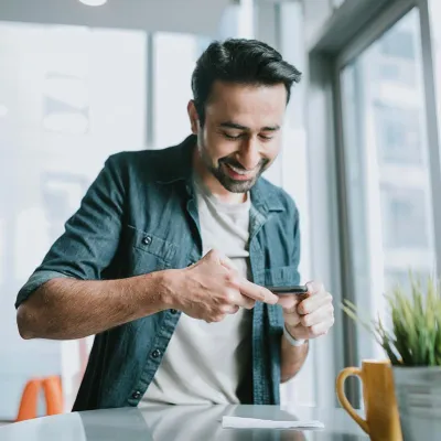 Man taking a picture with his smartphone
