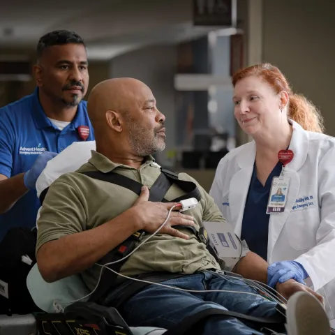 A cardiac Patient with healthcare workers.