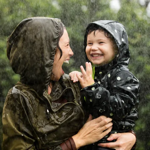 Playtime under the sprinkler.