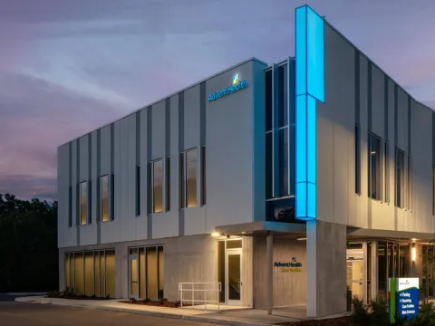 An Exterior Photo of an AdventHealth Care Pavilion at Dawn.