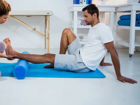 Man having physical therapy on his foot