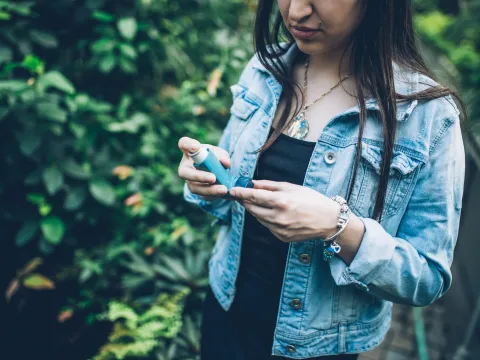 When exposed to plants and pollen, an asthmatic woman has her inhaler on hand