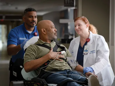 A cardiac Patient with healthcare workers.