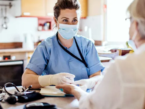 Patient talking to their doctor.